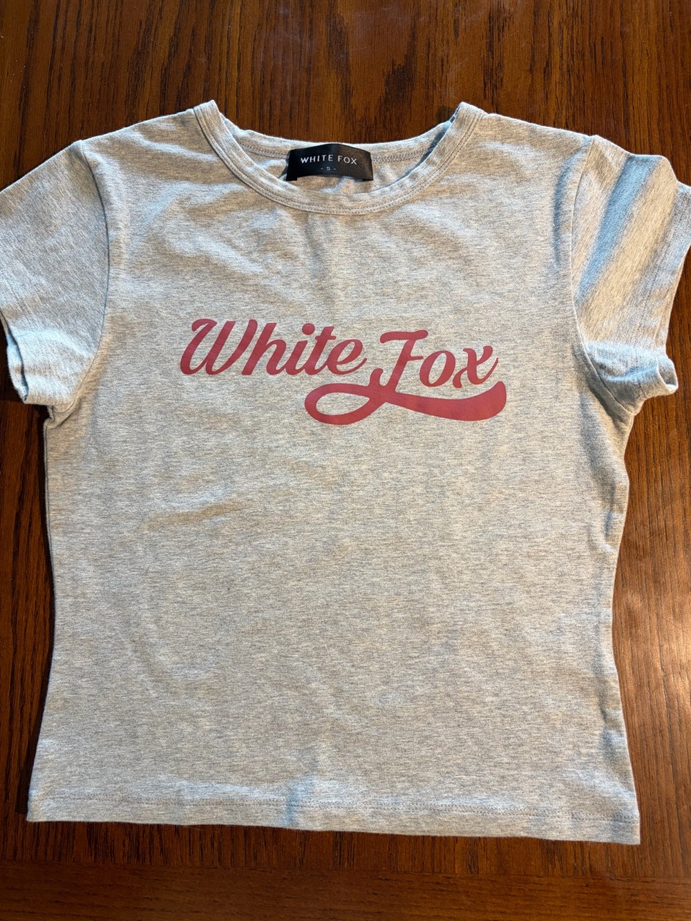 Women's White Fox Moving Different Baby Tee